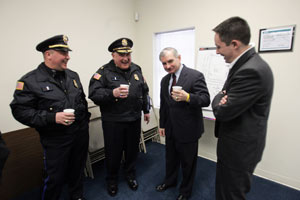 Reed jokes with state Rep. Ed Pacheco, right, and from left, Burrillville police Lt. Kevin S. SanAntonio and Police Chief Bernard Gannon at the Pascoag Water Authority. Journal photo / Mary Murphy Reed jokes with state Rep. Ed Pacheco, right, and from left, Burrillville police Lt. Kevin S. SanAntonio and Police Chief Bernard Gannon at the Pascoag Water Authority. Journal photo / Mary Murphy