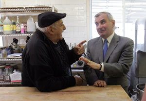 Reed chats with Joseph Monda, owner of the building that houses Buono's Bakery on Hartford Avenue, in Cranston. Reed grew up on Pontiac Avenue in that city. Reed chats with Joseph Monda, owner of the building that houses Buono's Bakery on Hartford Avenue, in Cranston. Reed grew up on Pontiac Avenue in that city