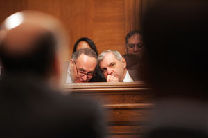 Reed and Sen. Charles Schumer, D-N.Y., talk during a Banking Committee hearing with the Federal Reserve chairman. Journal photo / Mary Murphy Reed and Sen. Charles Schumer, D-N.Y., talk during a Banking Committee hearing with the Federal Reserve chairman. Journal photo / Mary Murphy